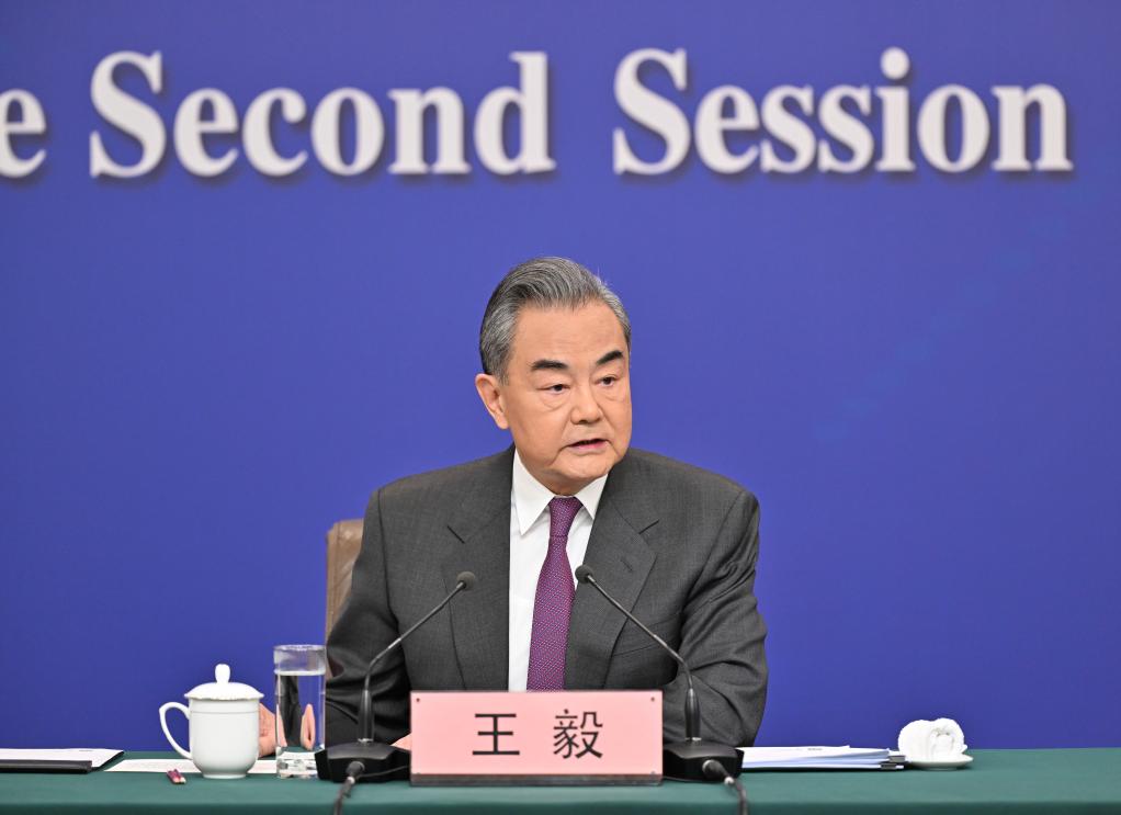 王毅回答中外记者提问