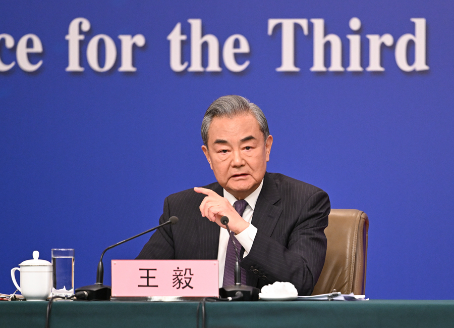 王毅回答中外记者提问